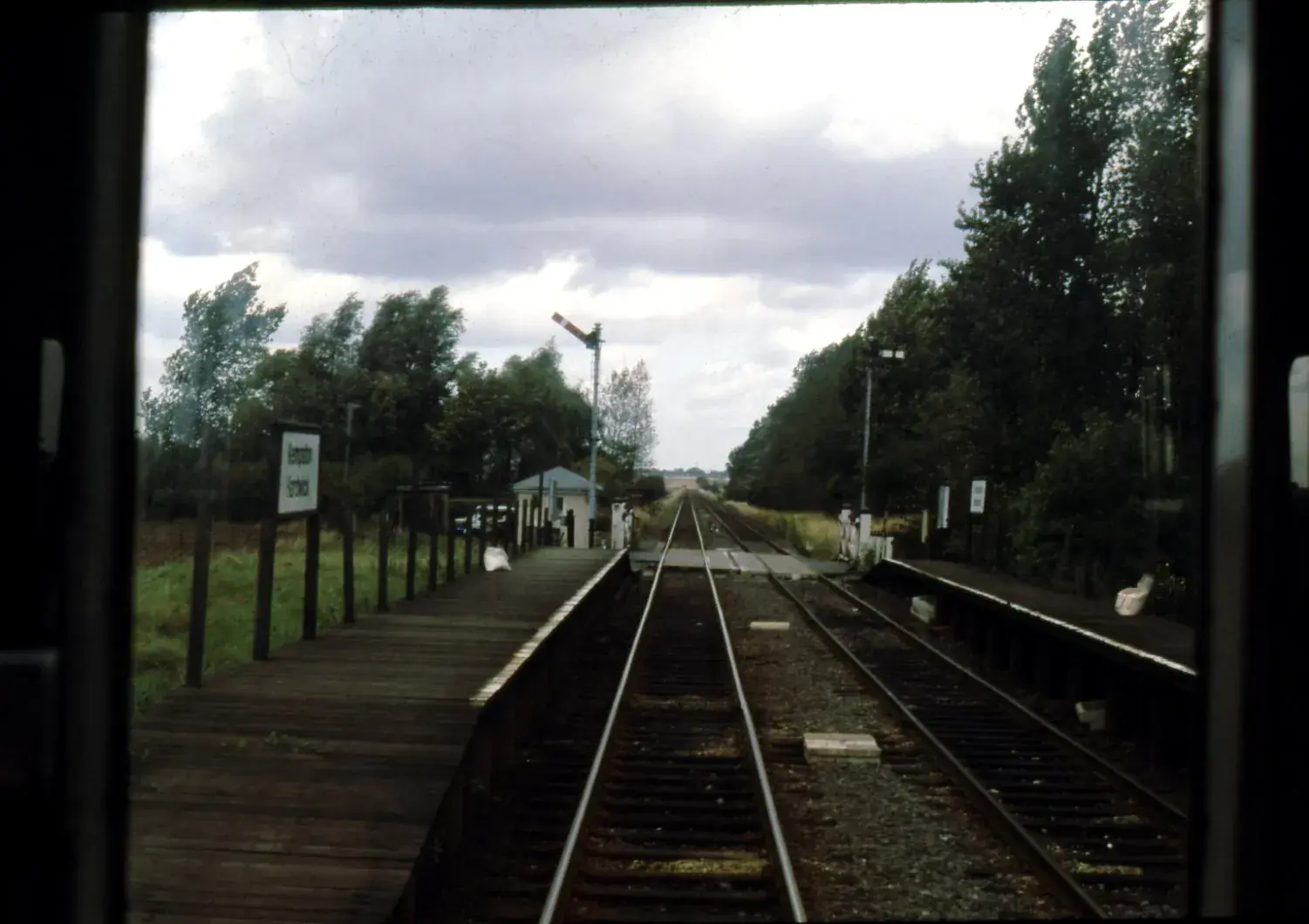 The platforms and track at Kempston Hardwick station, seen from a train